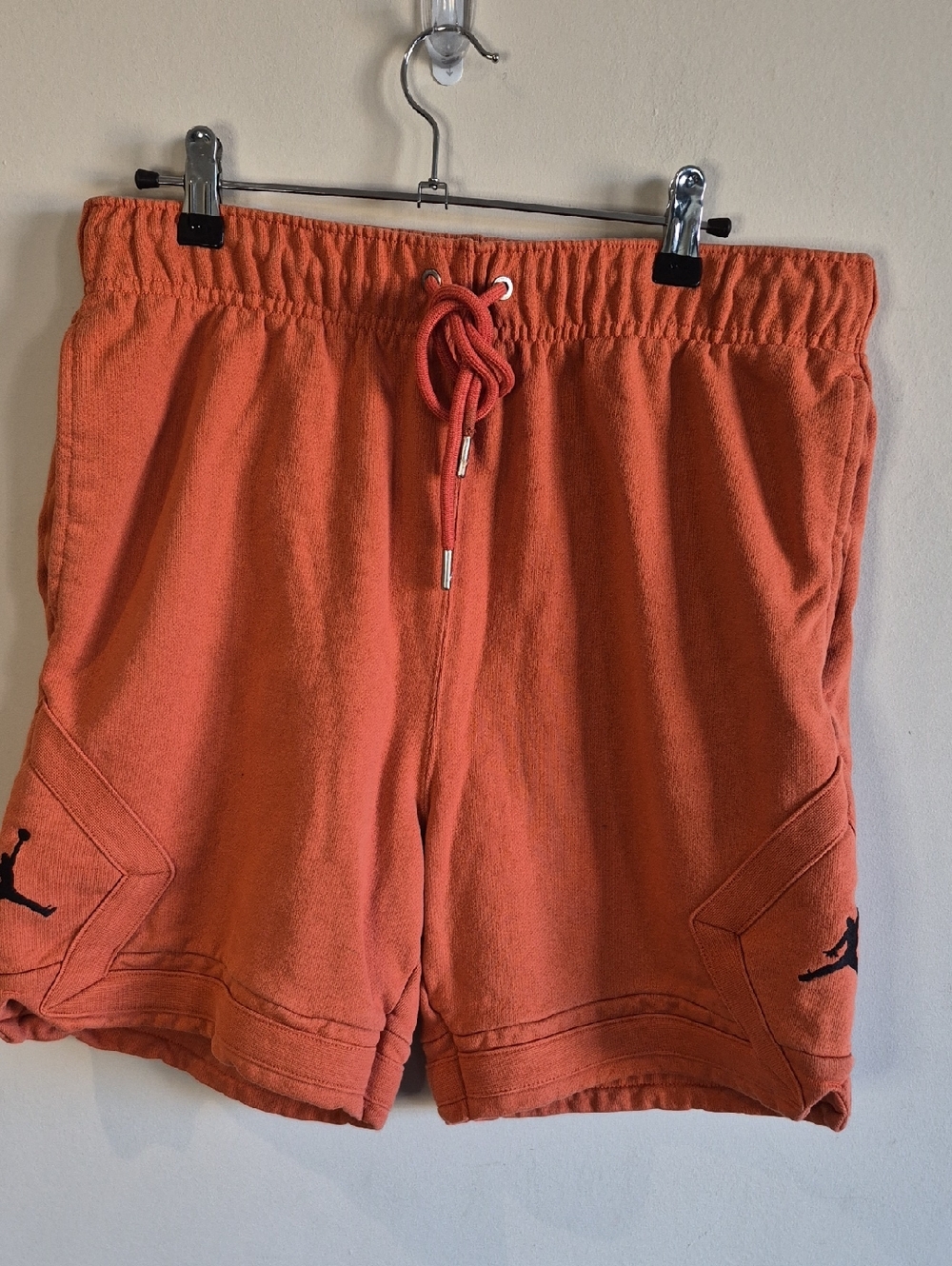 Jordan Orange Terry Shorts with Black Jumpman Accents